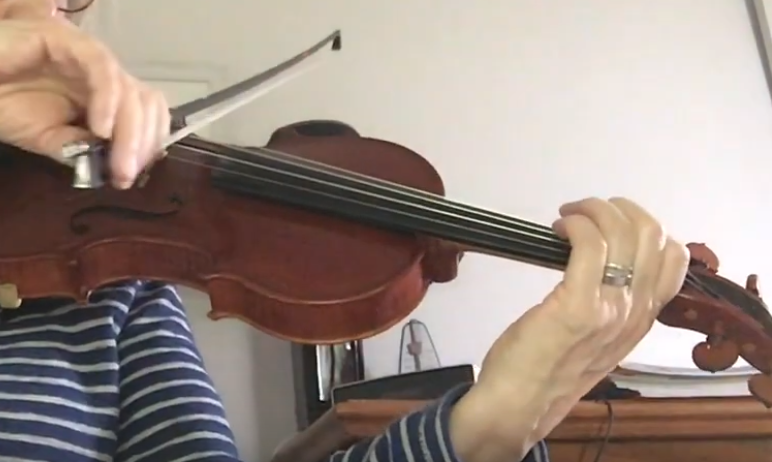 Adult violin pupil hands